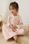 Salopette large en coton à imprimé fleuri classique avec bavette et bretelles boutonnées pour enfants