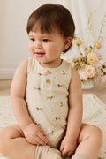 Combinaison-short en coton biologique à imprimé ludique avec détails boutonnés et pressions pour bébés